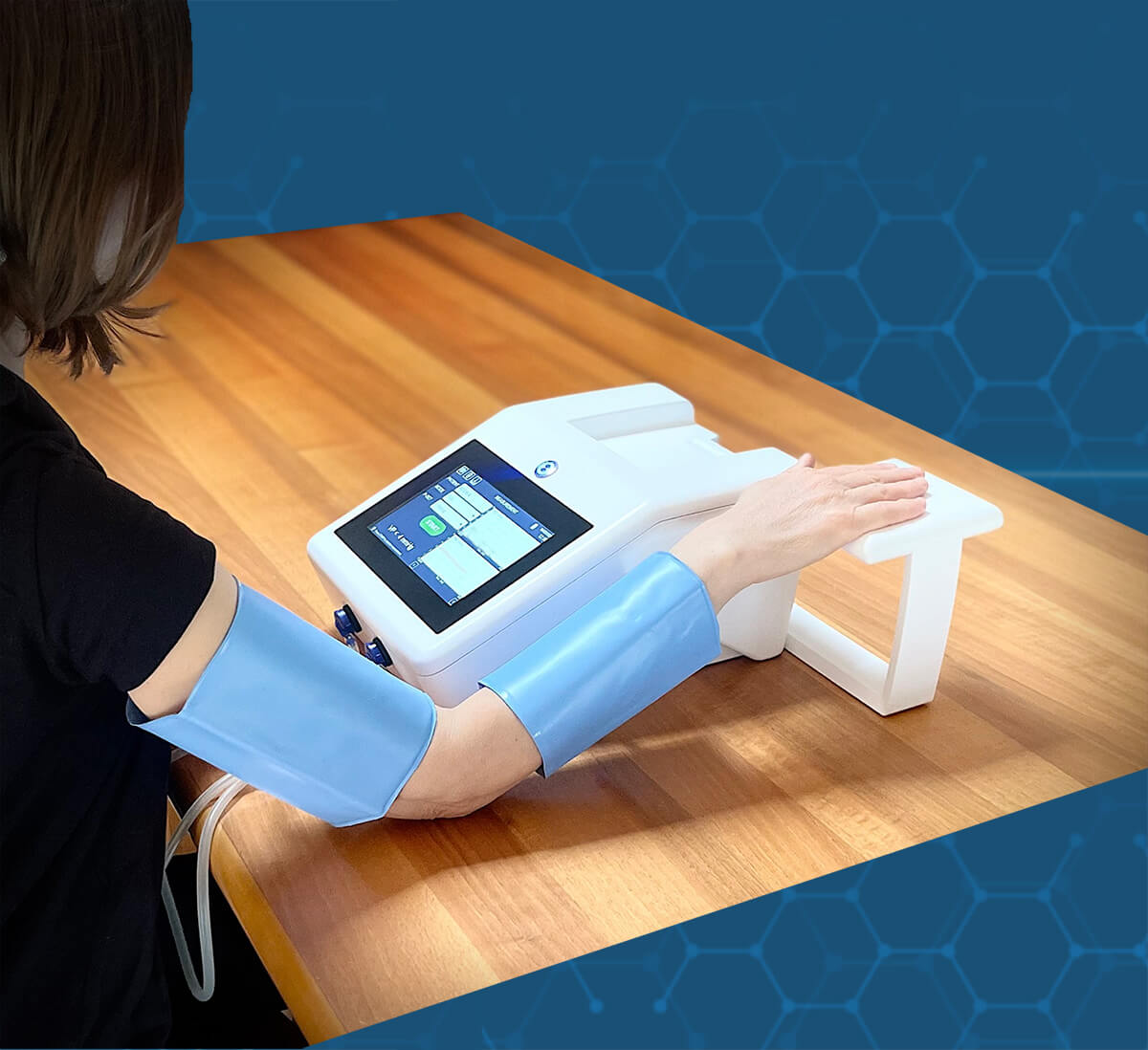 VenCoM system in use: the cuffs placed around the patient's arm